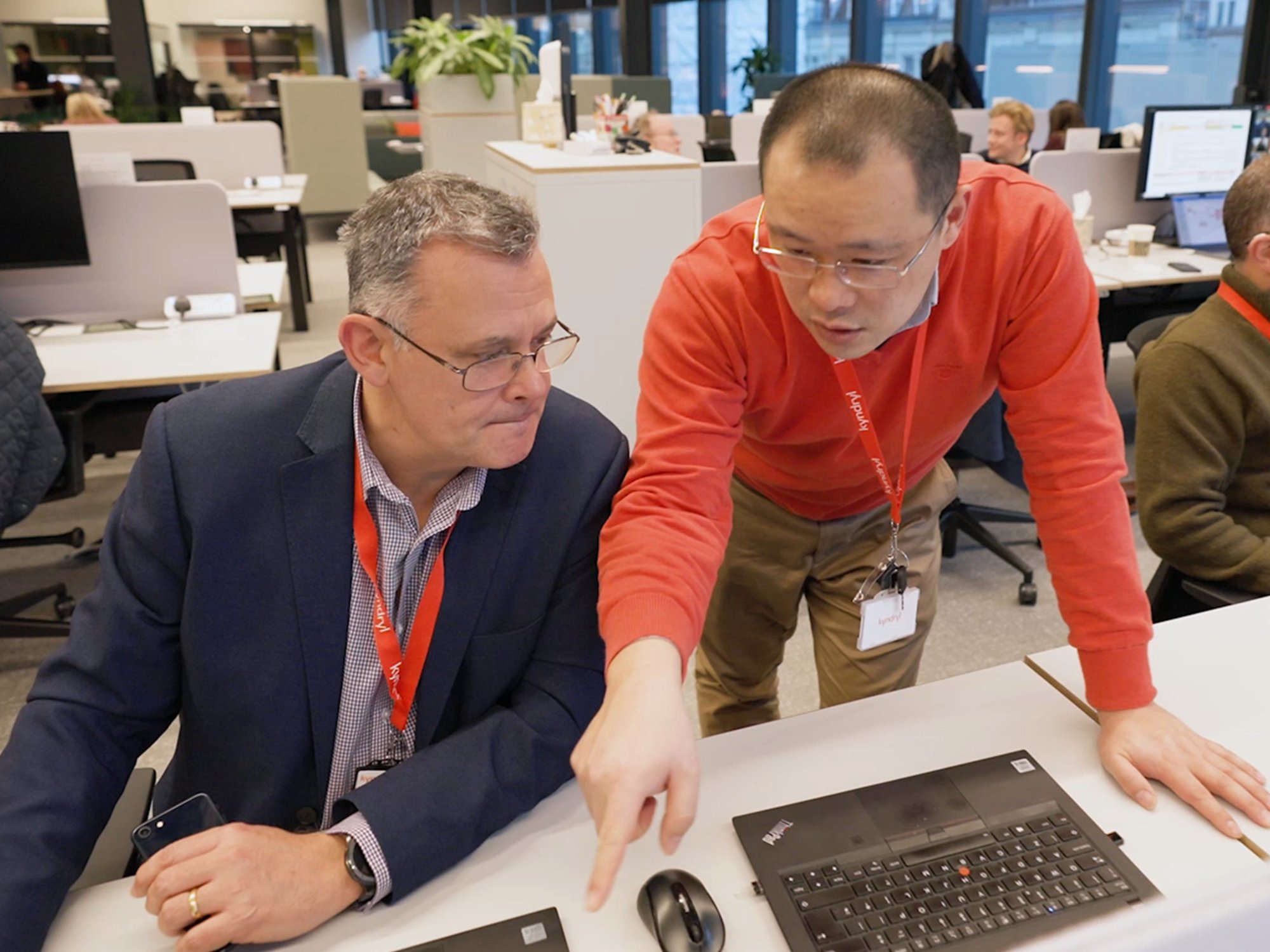 Kyndryl employees working on a business project in the NYC office