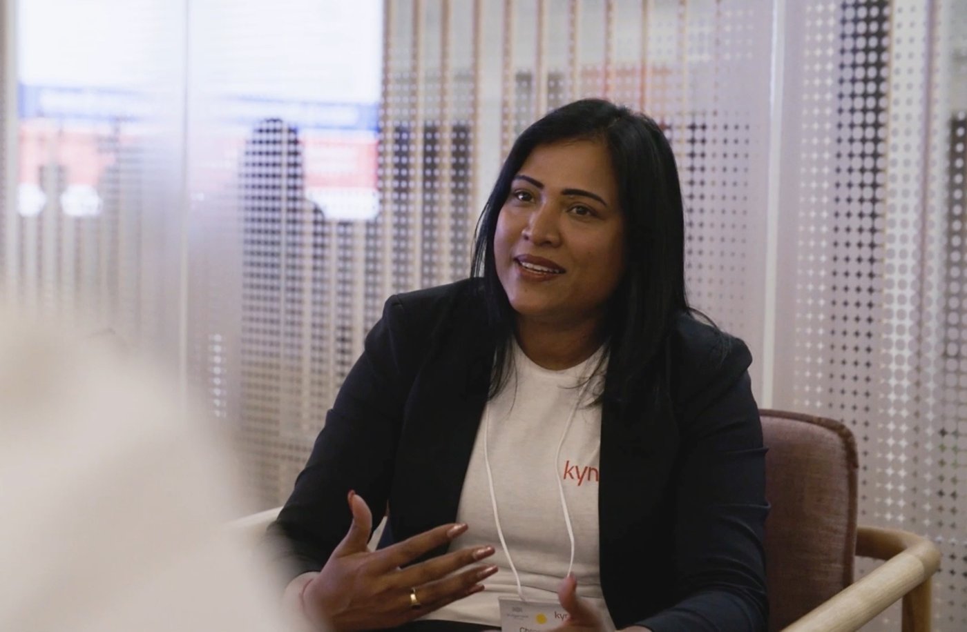 Female Kyndryl employee from India discussing a project