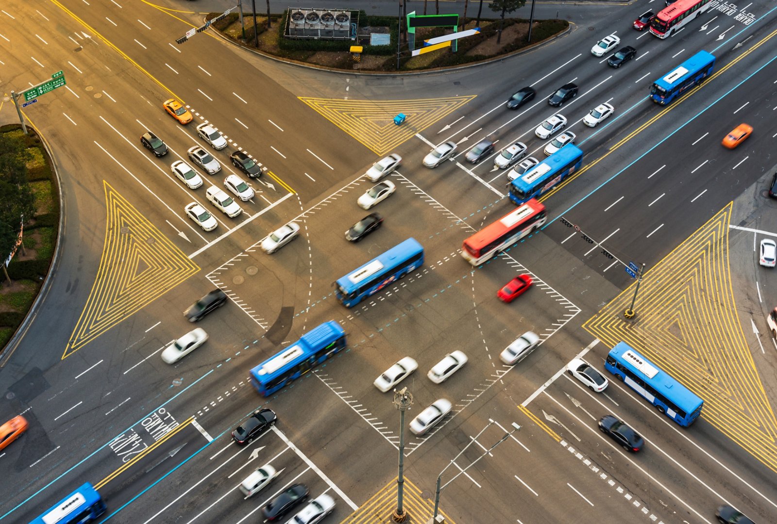 Rush hour traffic zips through an intersection in the Gangnam district of Seoul, South Korea.