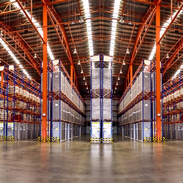 Warehouse industrial and logistics companies. Commercial warehouse. Huge distribution warehouse with high shelves. Bottom view.