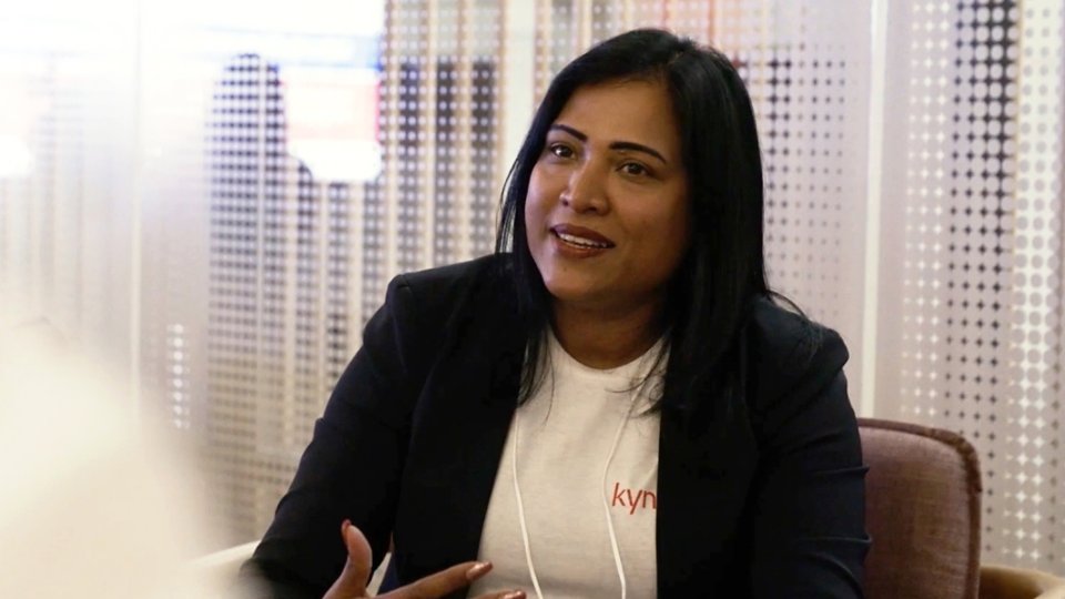 Kyndryl female employee from India discussing a business project