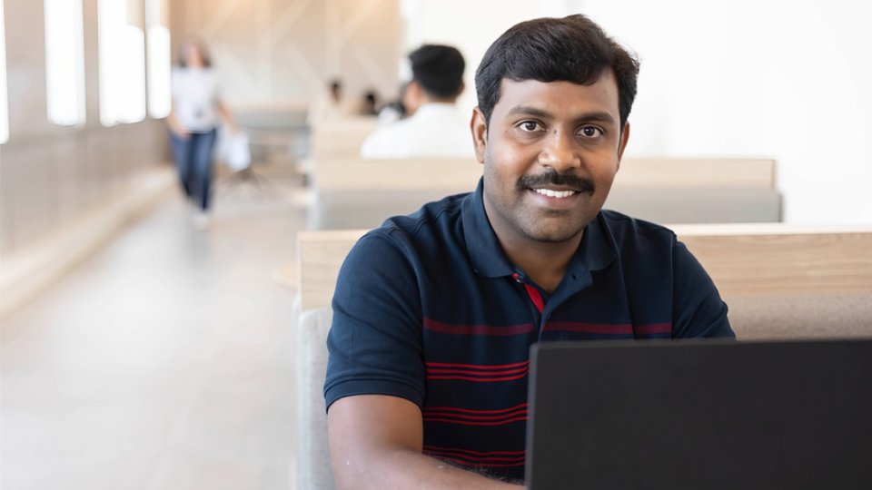 Kyndryl employee from India working on a cybersecurity project