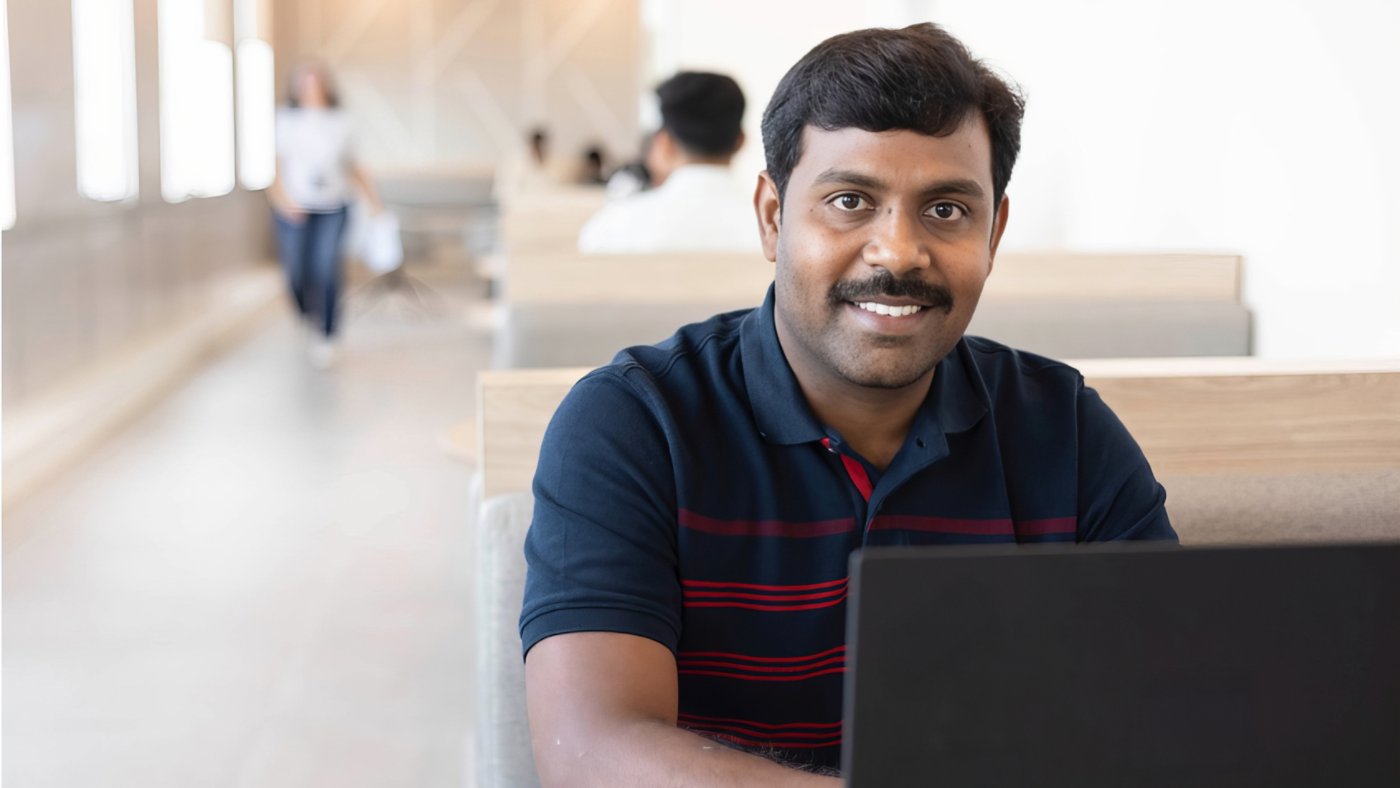 Kyndryl employee from India working on a cybersecurity project