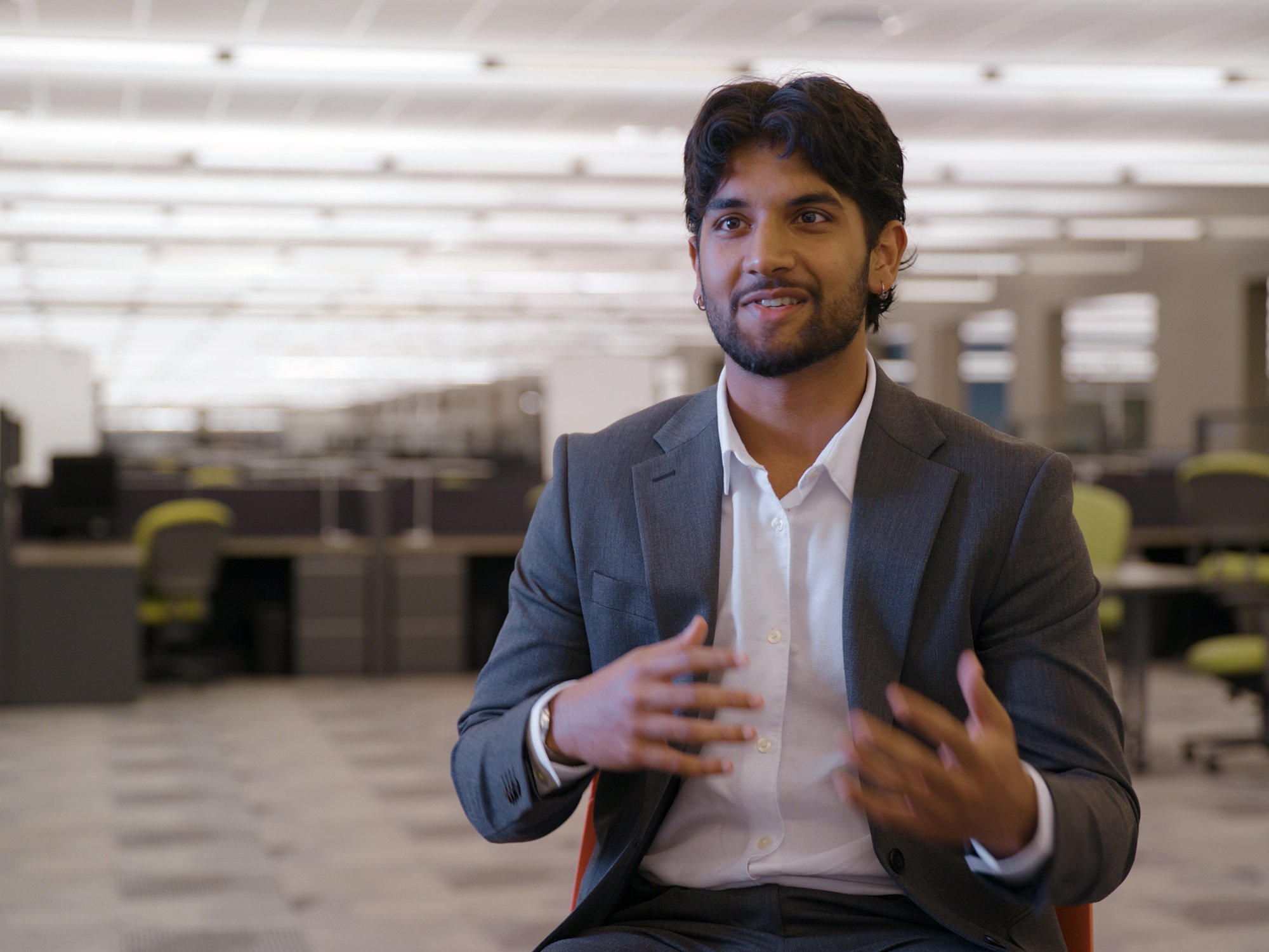 a kyndryl intern explaining his work at the company