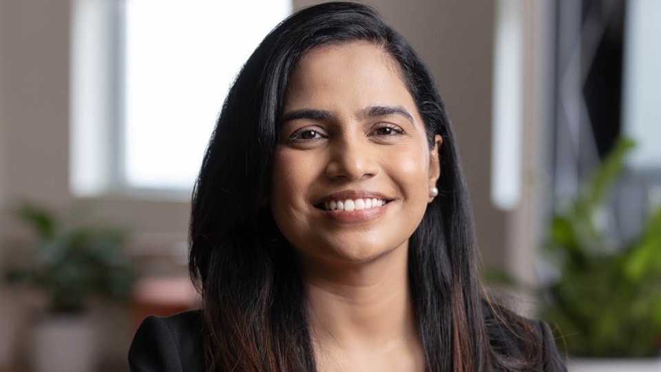 Shaon Shengupta, an employee from India being interviewed