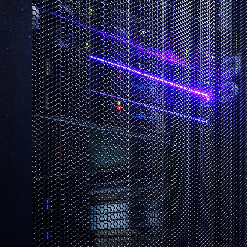 room with rows of server hardware in the data center