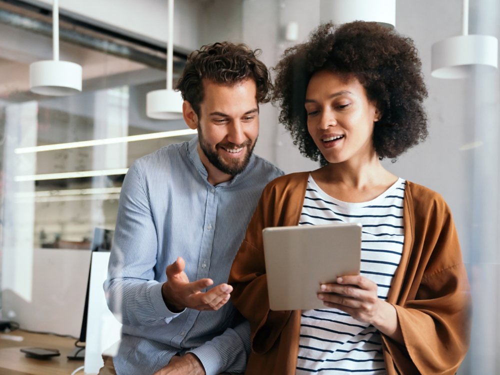 Successful group of designers, business people at work in corporate office. Startup, happy teamwork concept.