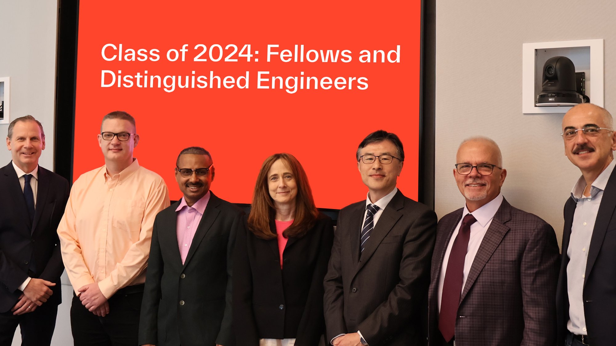Kyndryl Chairman and CEO Martin Schroeter (left) and Chief Technology Officer Antoine Shagoury (right) with Kyndryl's 2024 Class of Distinguished Engineers