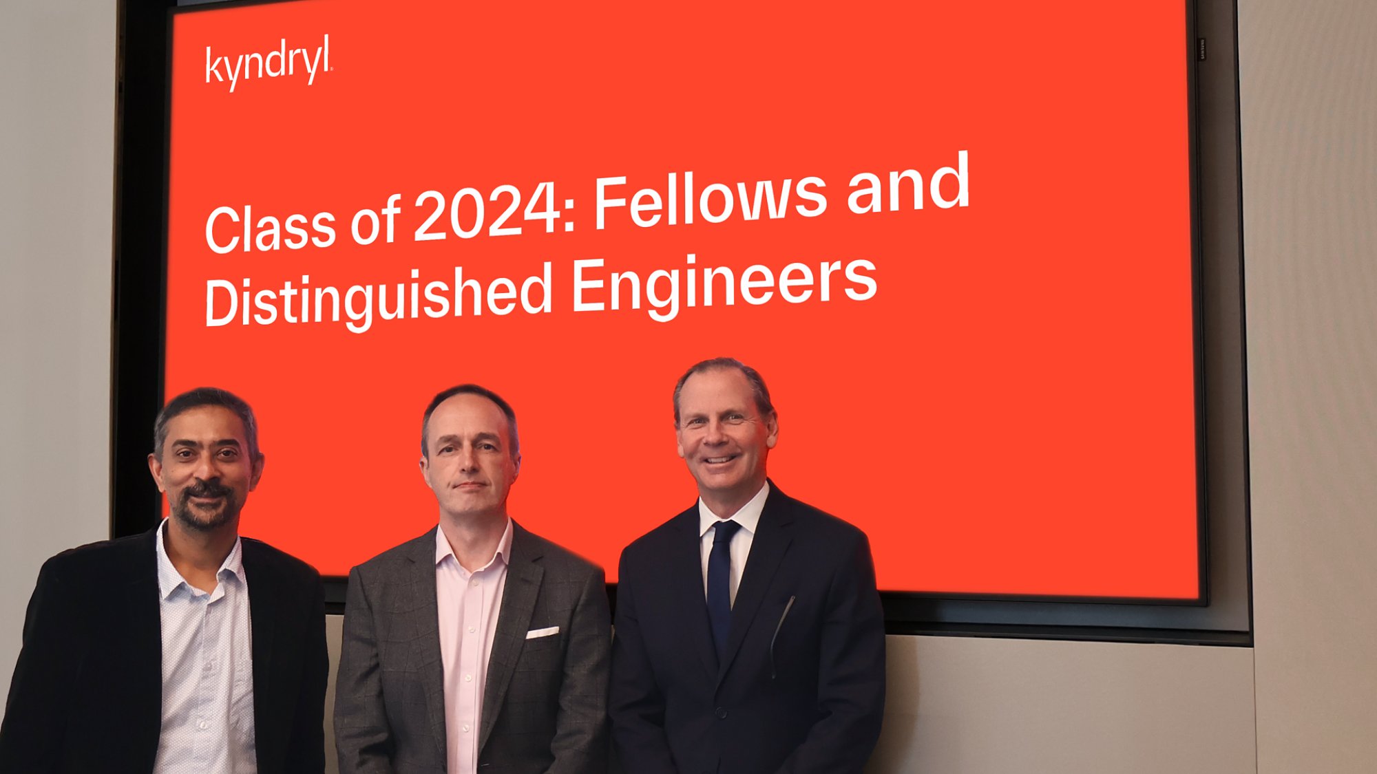 Kyndryl Chairman and CEO Martin Schroeter (right) with Kyndryl's 2024 Class of Fellows