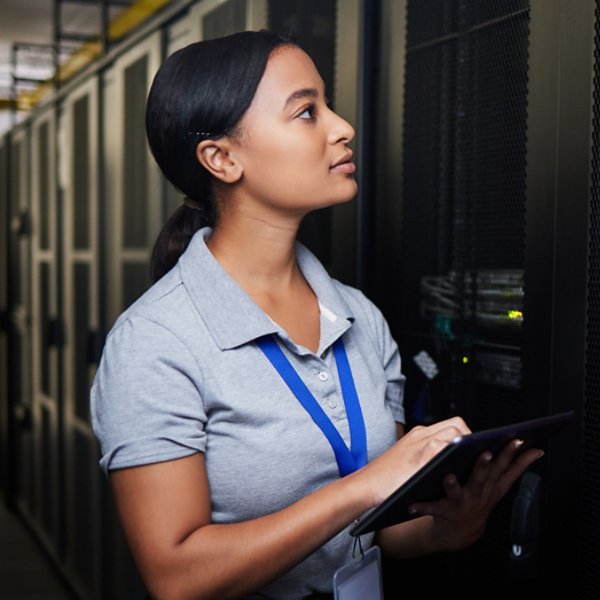 Woman, engineering tablet and server room, data center inspection or system solution for cybersecurity coding. IT person on digital technology, cables check and business power or programming hardware.