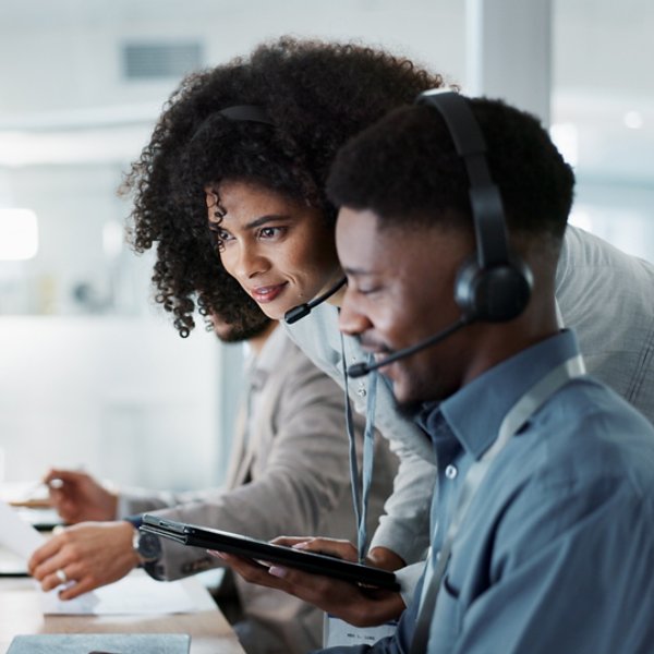 Call center computer, happy mentor and people for telemarketing sales, outsourcing or check onboarding progress. Technical support data, help desk teamwork and manager consulting agent on CRM info.