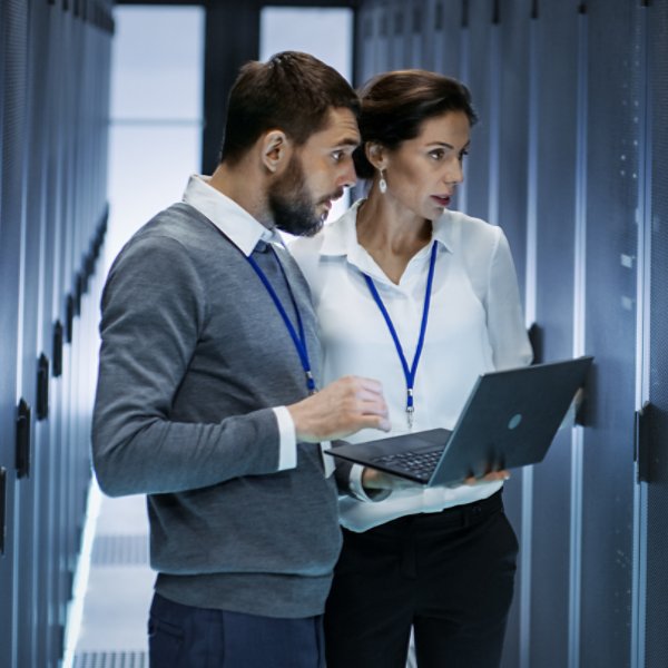They're Standing in Data Center, Rack Server Cabinet is Open.