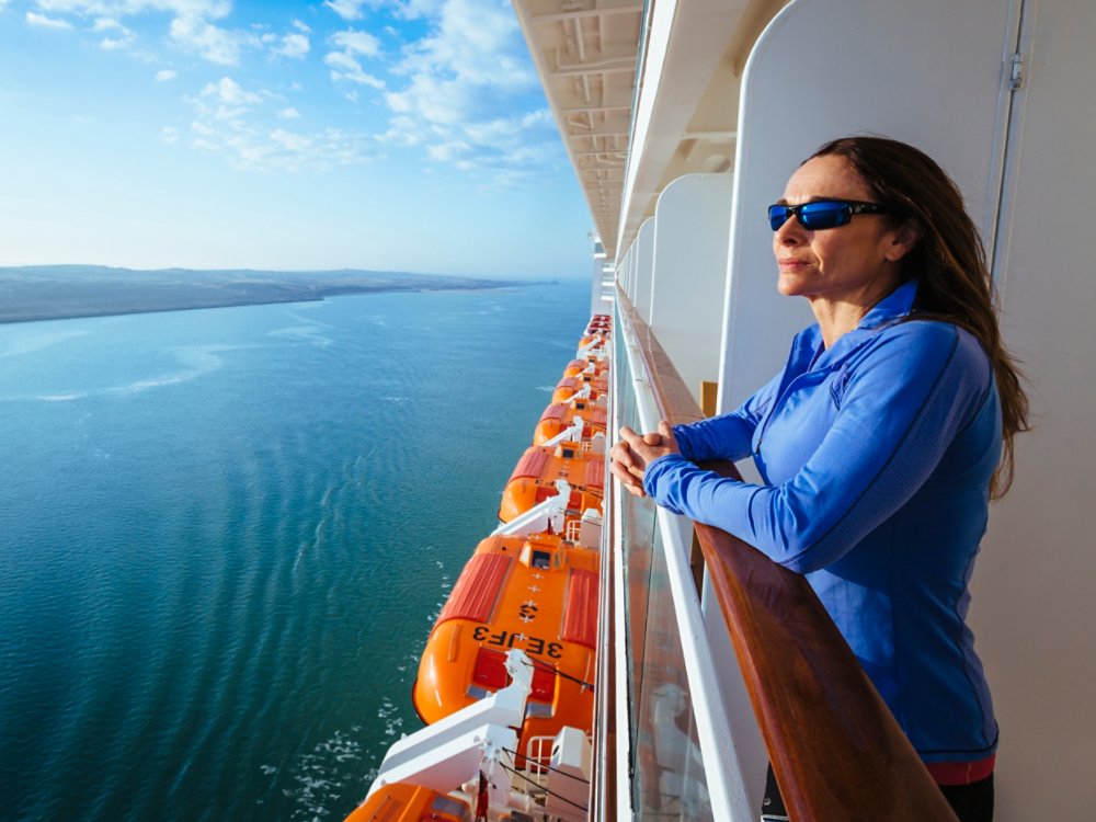 Watching from her cabin balcony.