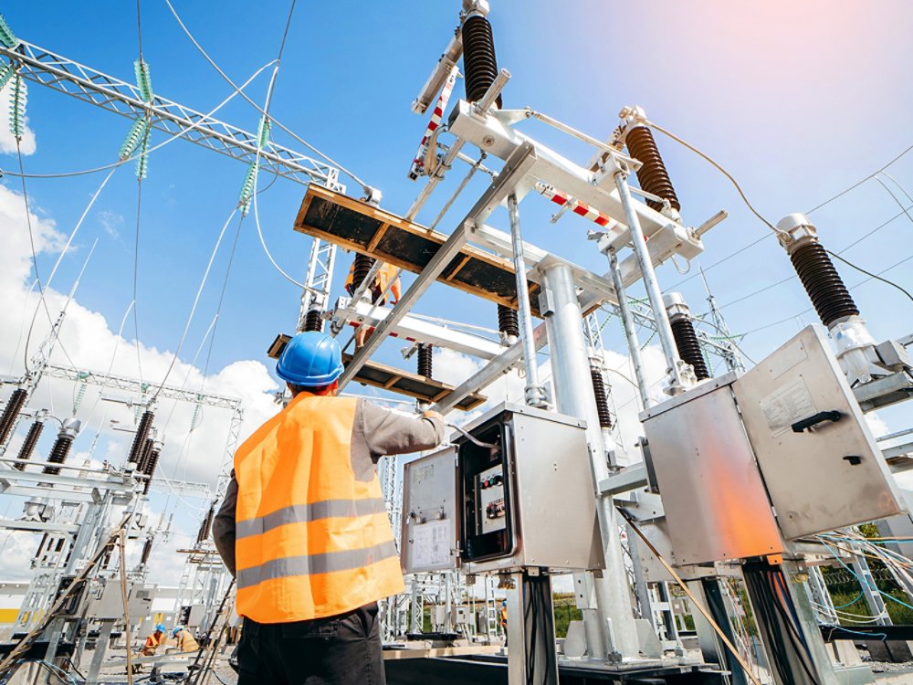 powerplant workers repairing electrical lines