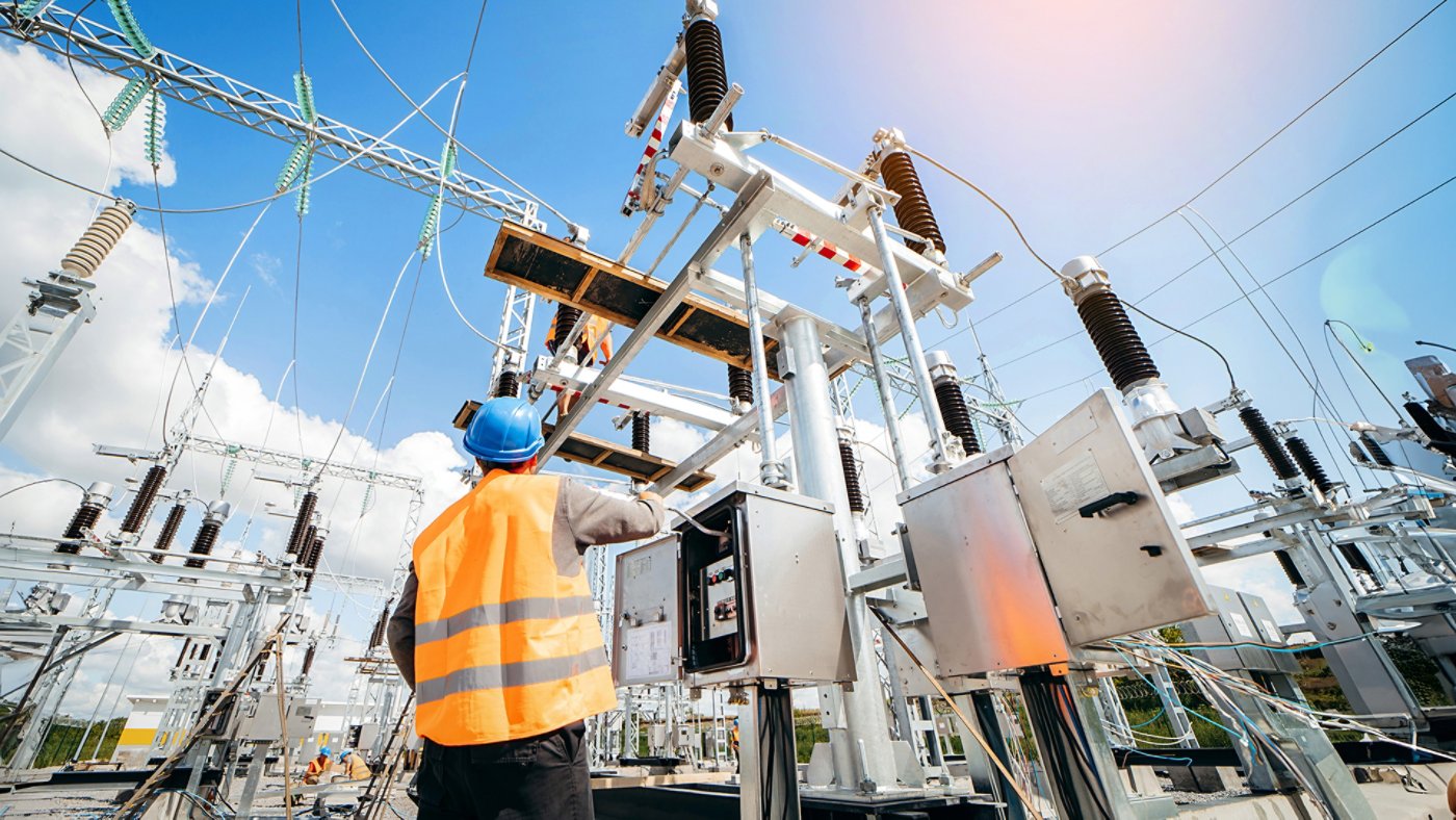 powerplant workers repairing electrical lines