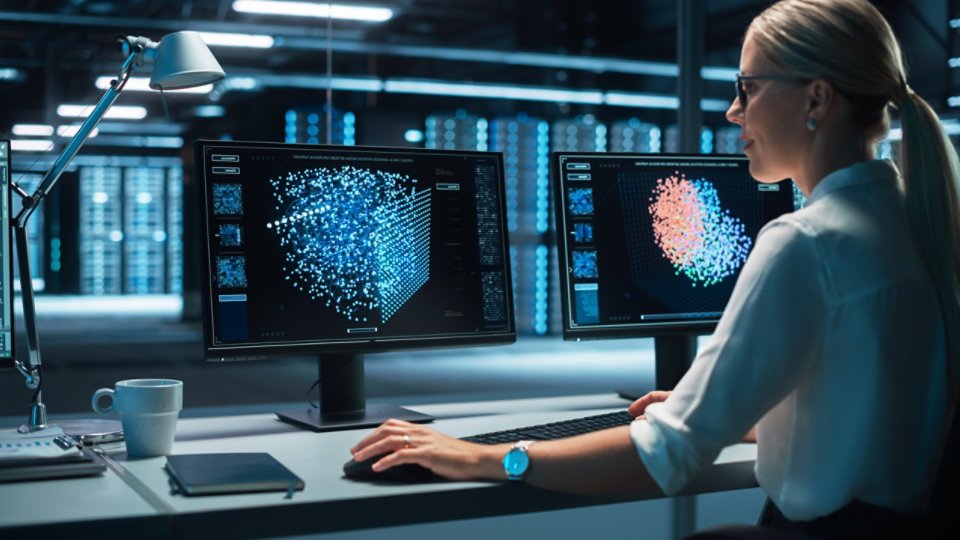 European Female Specialist Works on a Computer with Neural Network Visualisation in a Monitoring Center with Global Map Tracking on a Big Digital Screen. Big Data concept