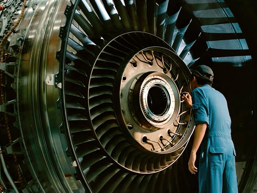 airplane engine being repaired