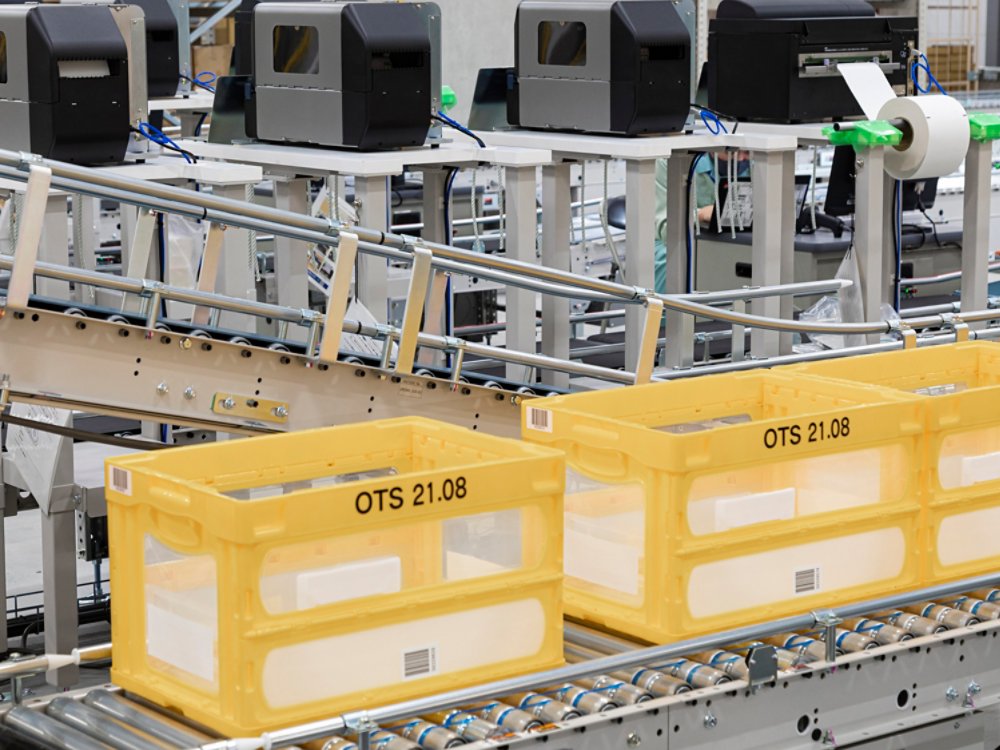 yellow boxes on a conveyor belt