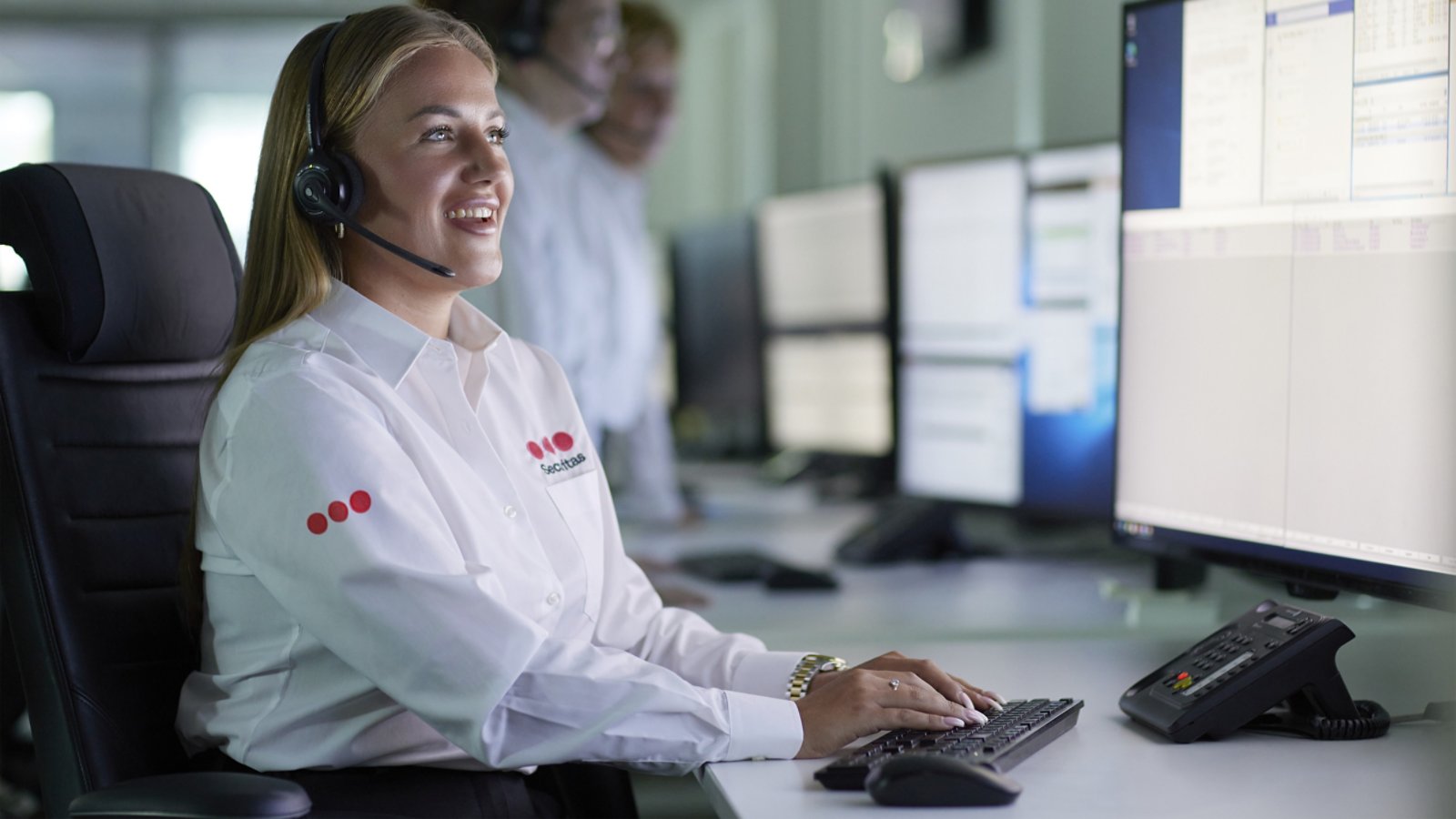 Securitas woman on headset