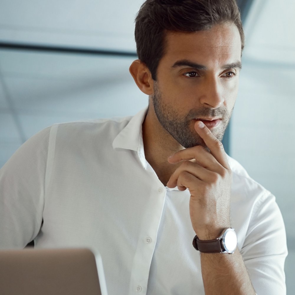 Man checking mainframe using a laptop