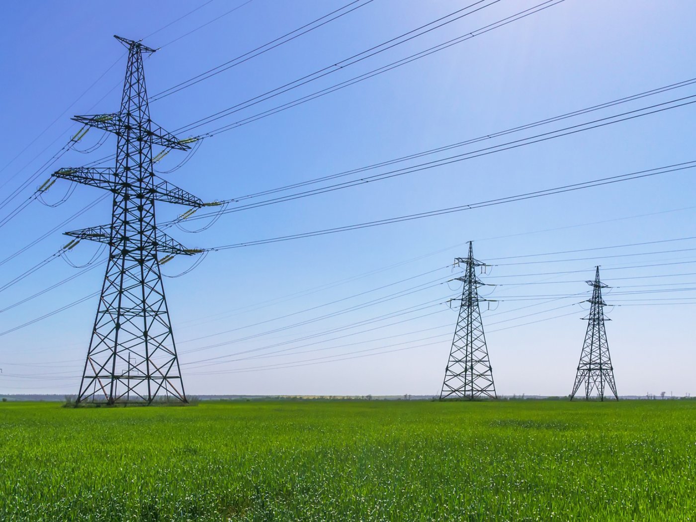 High-voltage power lines. Electricity distribution station. high voltage electric transmission tower. Distribution electric substation with power lines and transformers