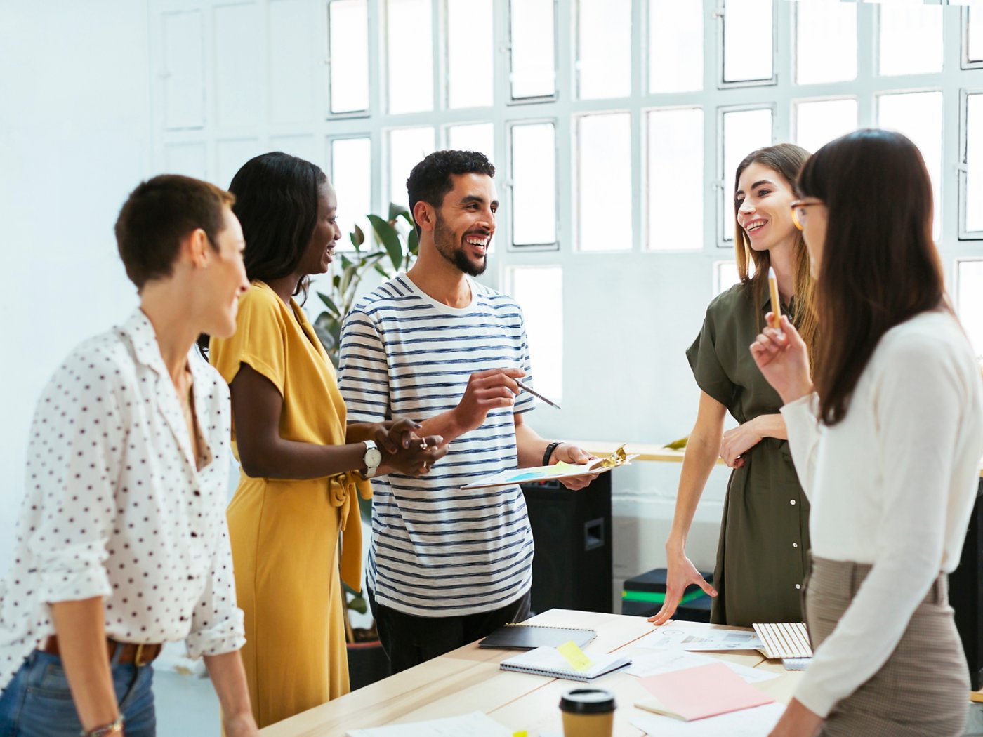 Multi ethnic coworking team at workplace in Barcelona 4X3