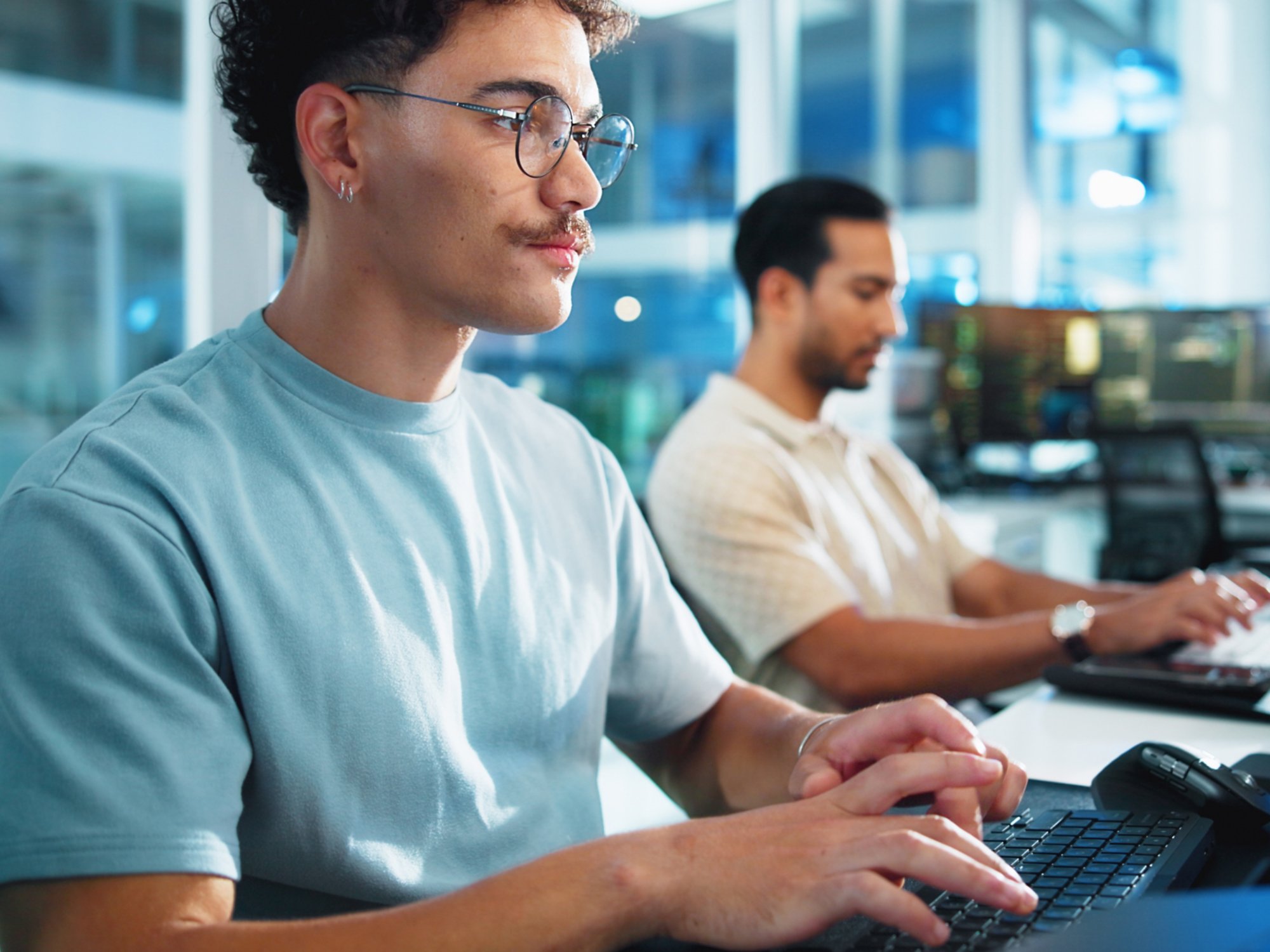 Business people, computer and men with programming, night and internet with software update. AI expert, coworking and employees with pc, evening and coding with specialist and research for database.