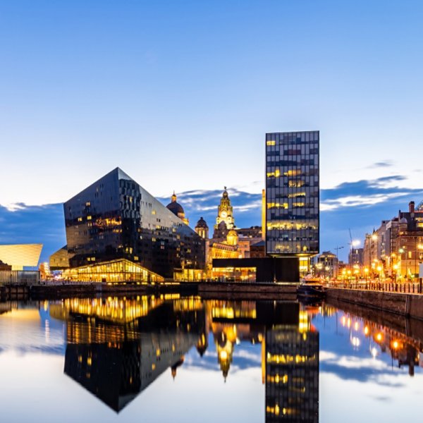 Liverpool Skyline building at Pier head and alber dock at sunset dusk, Liverpool England UK.