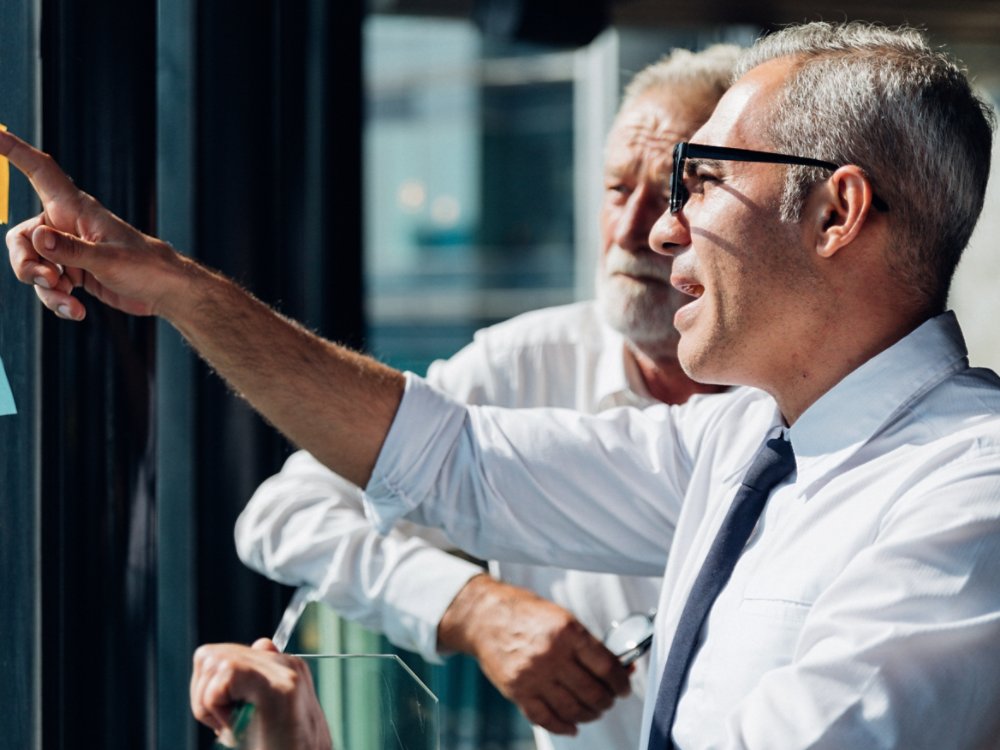 Cinematic images of corporate business team meeting discussion and startup concept. Successful businesspeople working with new startup project. Idea presentation, analyze plans.
