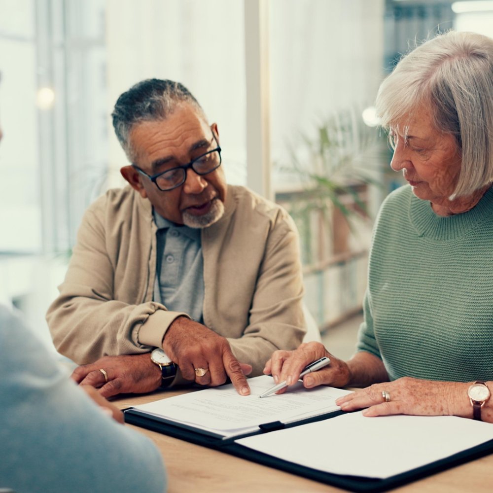 Office, lawyer or old couple with will, contract or document for retirement funding or compliance. Plan, advisor or married elderly clients with legal form or title deed agreement with life insurance.