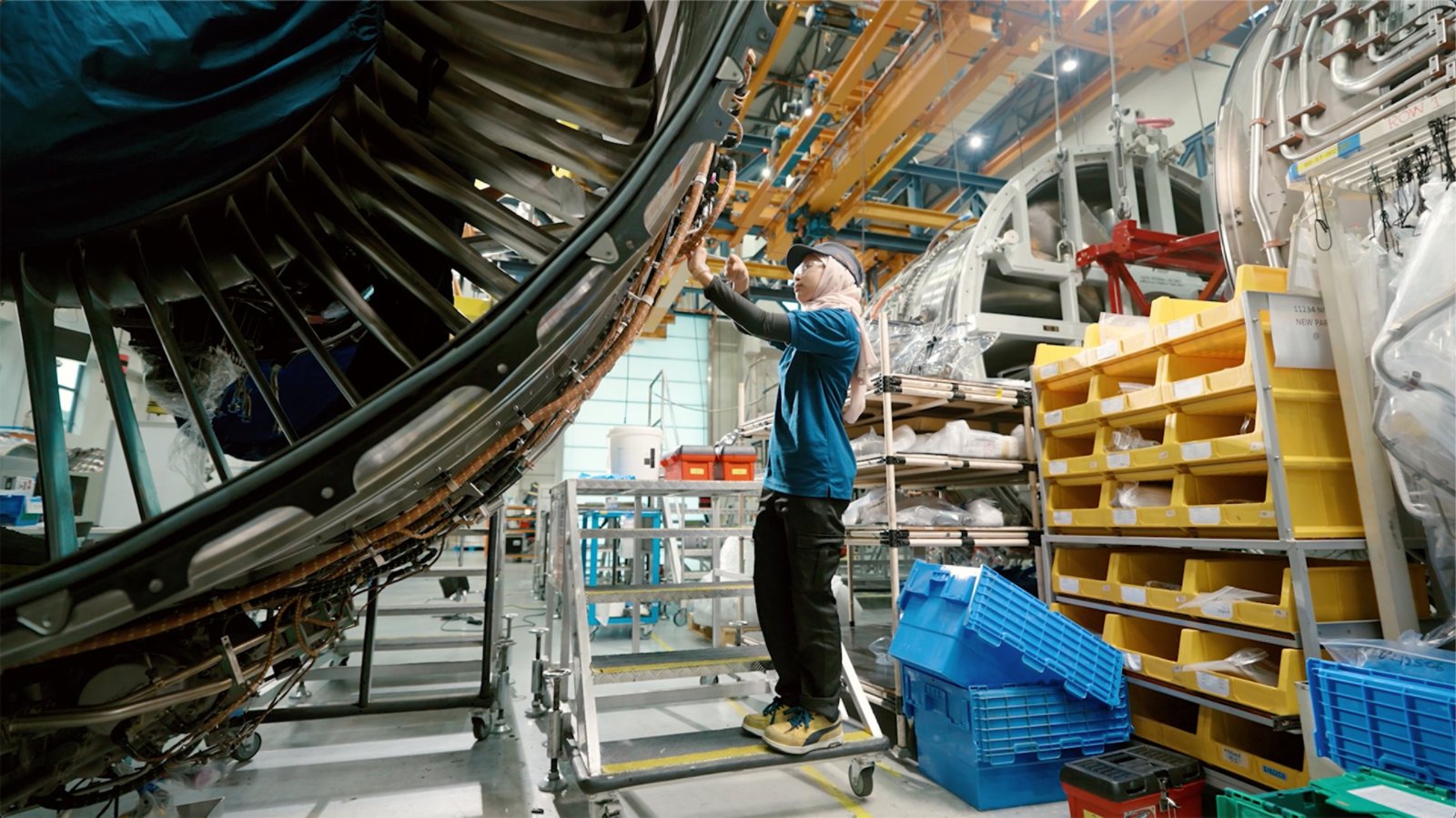 woman working on engine
