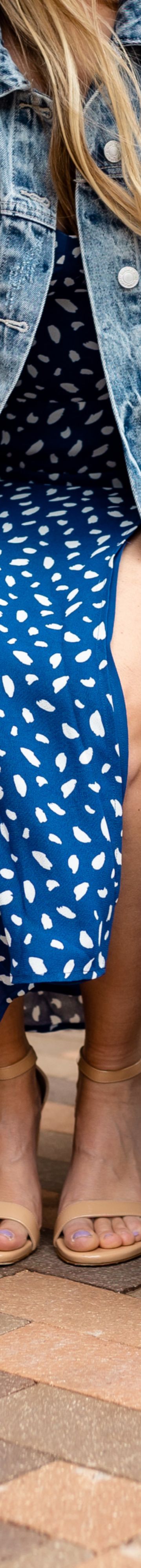 Woman with Suitcases