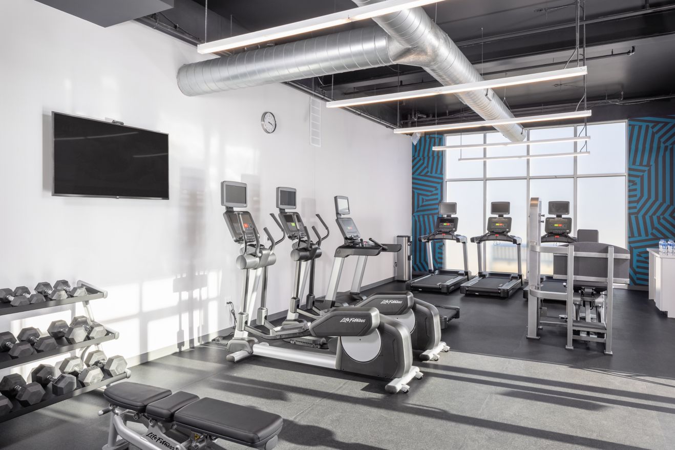 fitness center with cardio and free weights