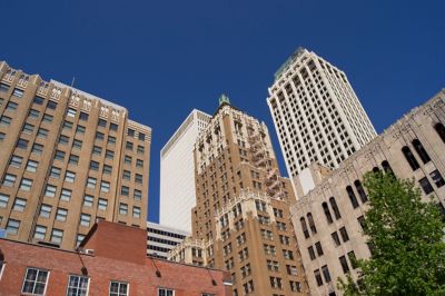 Looking up at art deco buildings