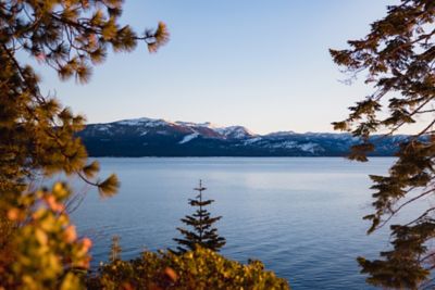 A view of a lake with mountains in the distance