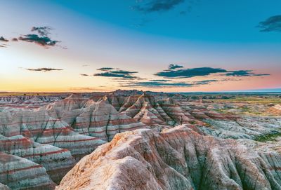 Sweeping views and pink skies over Badlands National Park
