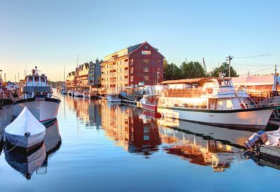 Boats docked in water