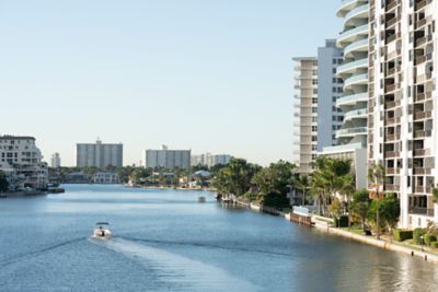 Boat on canal through city