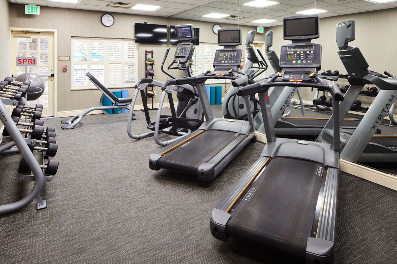 Hotel fitness center including including treadmill