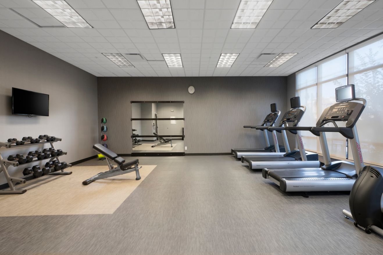 Fitness center featuring updated equipment.
