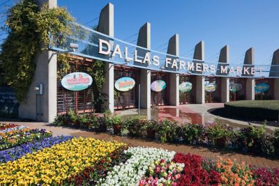 Large sign with flowers in front