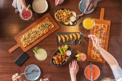 Wings and flatbread on table
