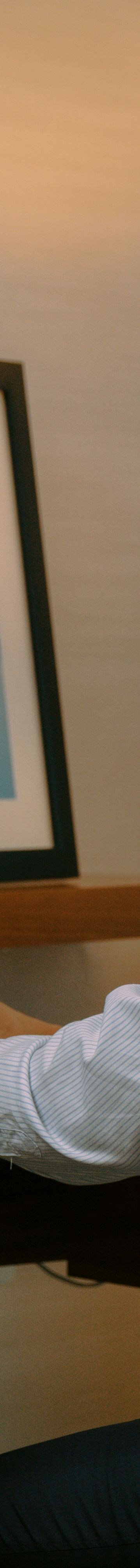 SANGE Man Working at Desk