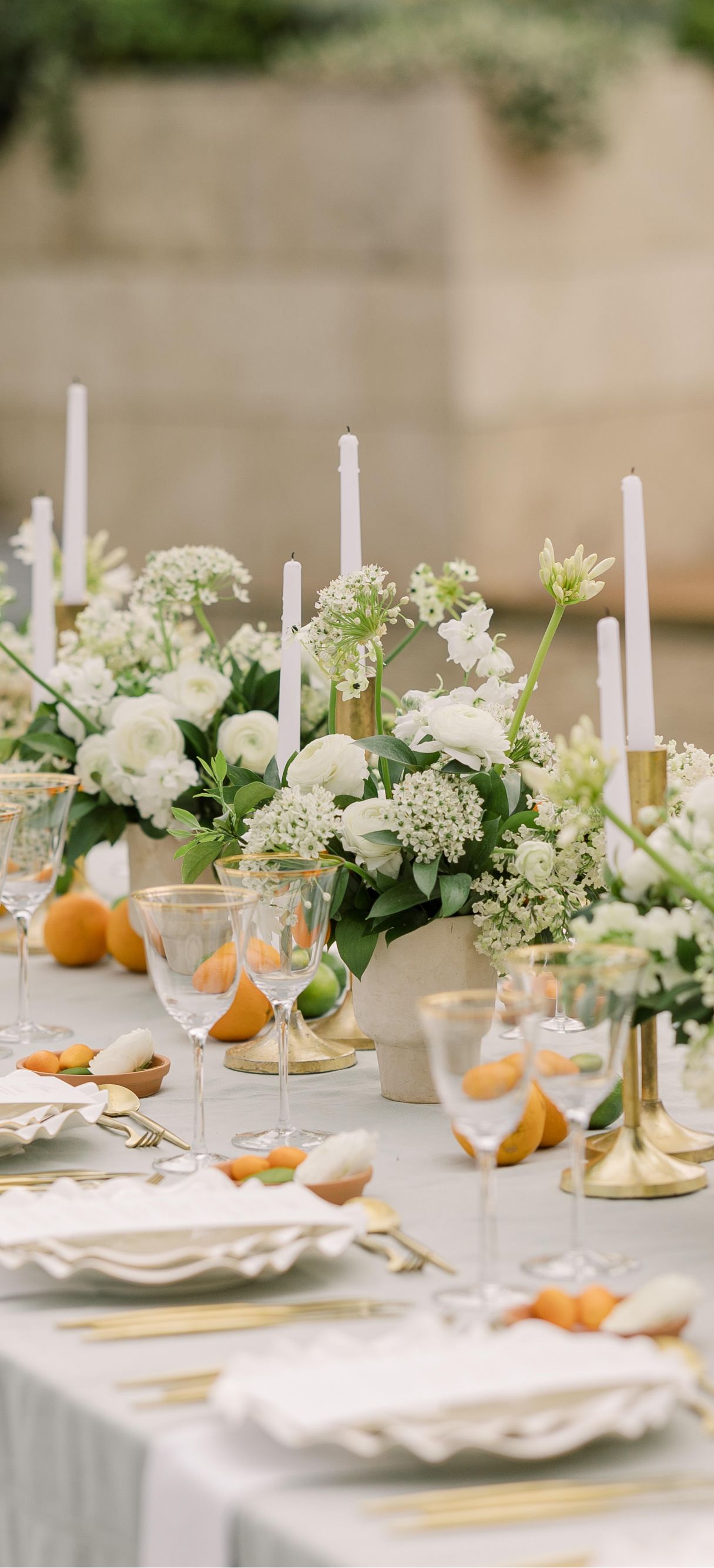 Outdoor wedding reception dinner table place settings