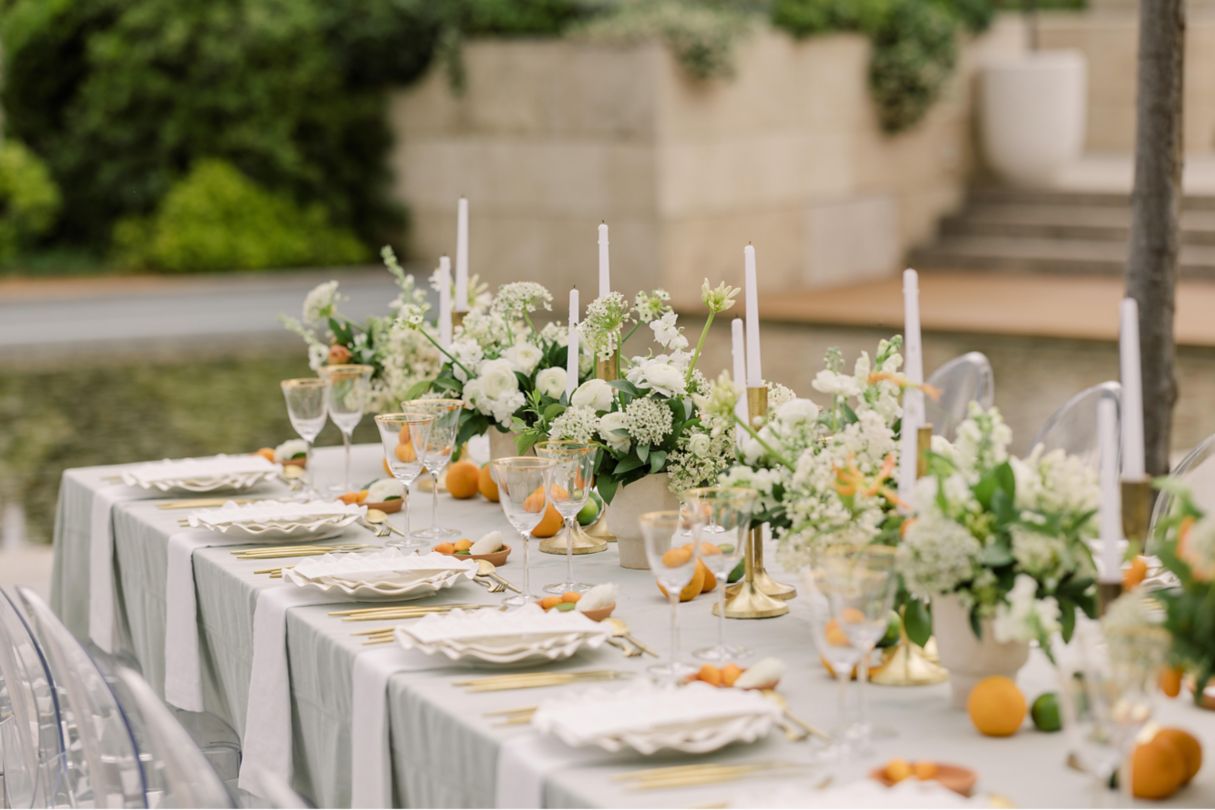 Outdoor wedding reception dinner table place settings