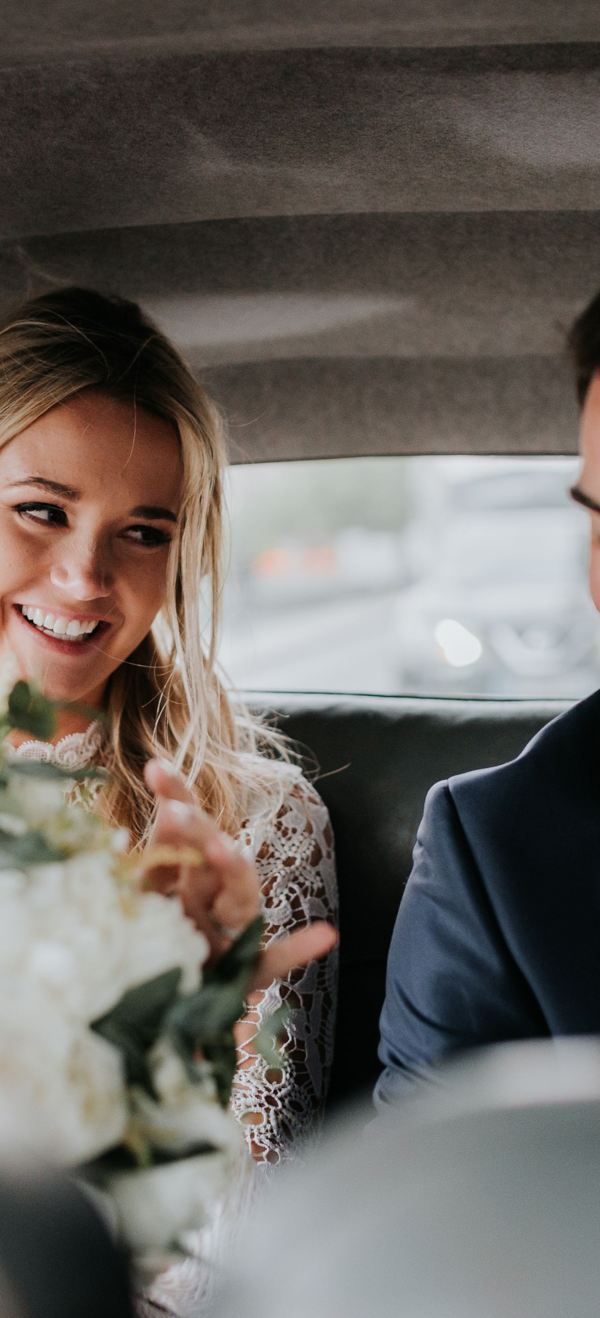 Wedding couple in car