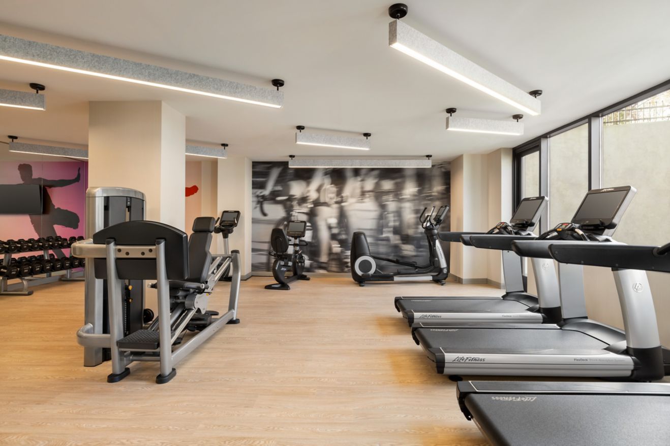 Fitness room with treadmills, free weights