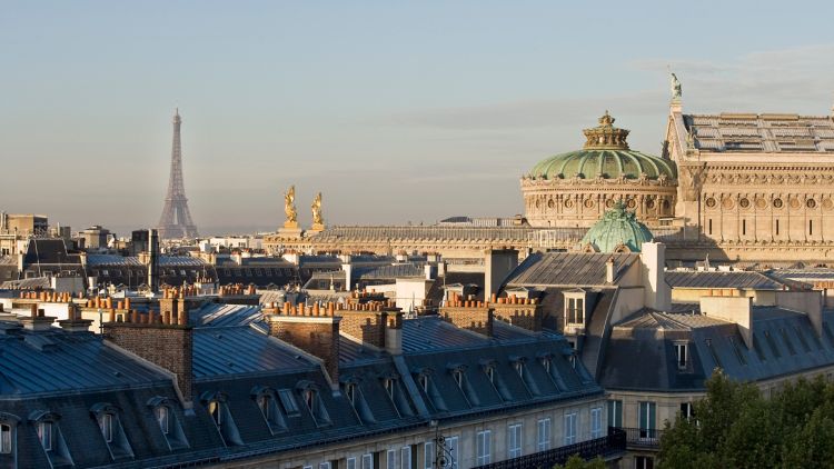 Iconic structures of Paris including the Eiffel Tower and Paris Opera House as seen from the Executive Lounge.