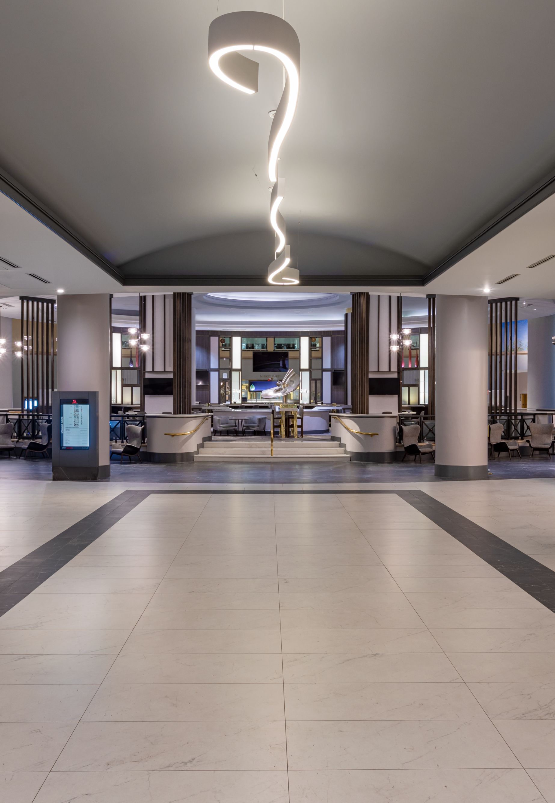 Lobby lounge reception area of Philadelphia Marriott Downtown hotel with custom lighting. 