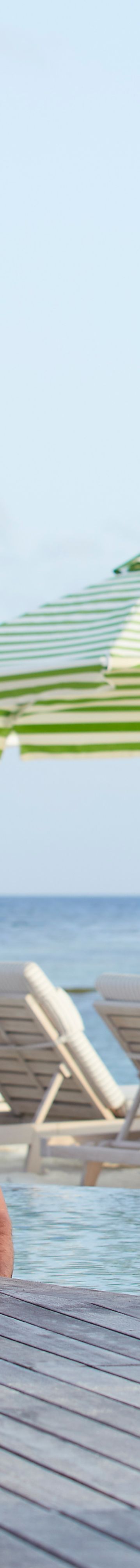 Couple lounging poolside